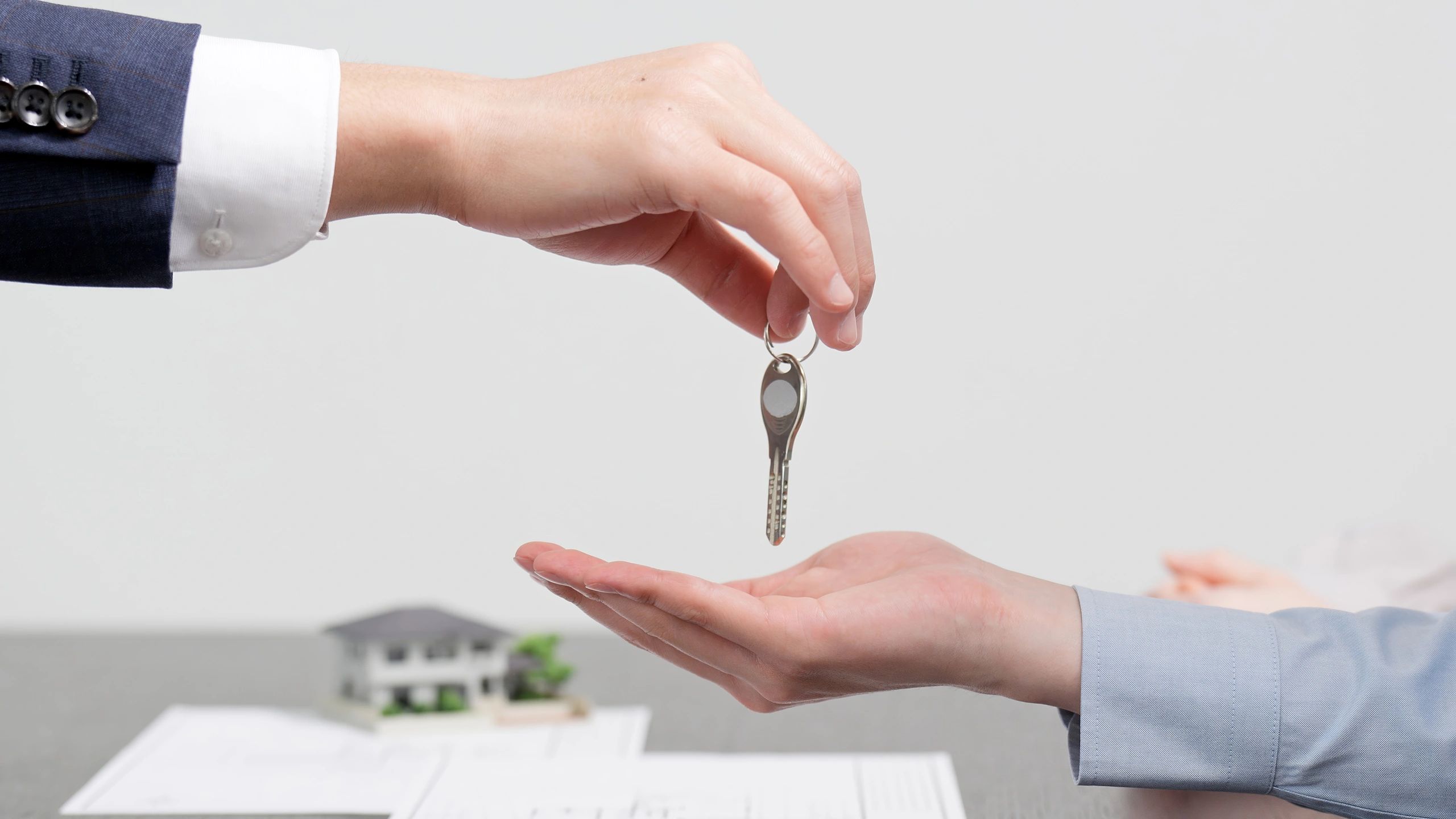 House keys being handed over after a property sale