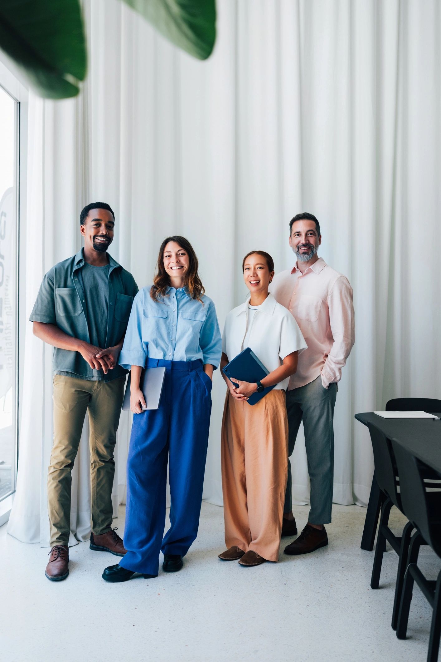Real estate team members in a modern office