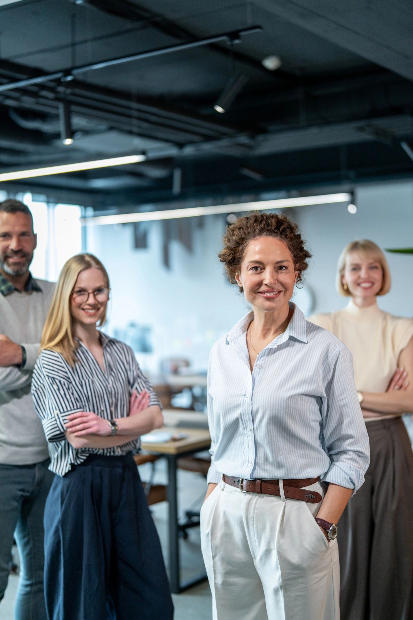 Confident property professionals standing together